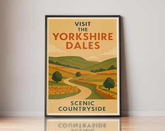 May include: A framed travel poster featuring a landscape illustration of the Yorkshire Dales with rolling green hills, golden fields, and a winding path. The text reads VISIT THE YORKSHIRE DALES and SCENIC COUNTRYSIDE in dark green and orange.