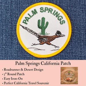 May include: A round embroidered patch with a yellow border and a white background. It features green text reading PALM SPRINGS, a green cactus, and a brown roadrunner bird. The patch is 3 inches in diameter and is designed for iron-on application.