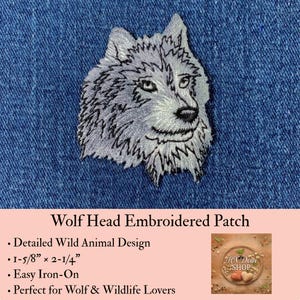 May include: An embroidered patch featuring a detailed gray and white wolf head design. The patch measures 1-5/8 inches by 2-1/4 inches and is designed for iron-on application. The wolf is depicted with intricate stitching and a focused expression.