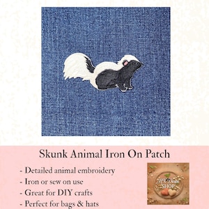 May include: A skunk animal iron-on patch. The patch features a detailed embroidered skunk in black, white, and pink. The patch is shown on a blue denim background. The text "Skunk Animal Iron On Patch" is below the patch.