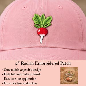 May include: A light pink baseball cap featuring a 2-inch embroidered radish patch on the front. The radish design displays a bright red bulb with a white root tip and vibrant green leafy tops, stitched with detailed thread work on the fabric.