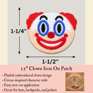 May include: An embroidered iron-on patch featuring a clown face with red hair, blue eyes, and a red nose and mouth. The patch measures 1-1/4 inches in height and 1-1/2 inches in width. The design includes white skin, black eyebrows, and a wide smile.