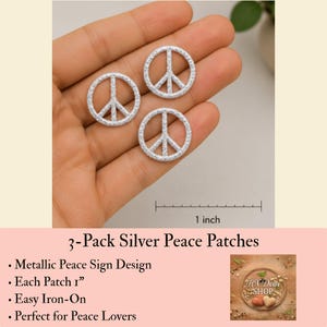 May include: Three circular silver-toned peace sign patches featuring a textured, sparkling surface. Each patch measures approximately 1 inch in diameter as indicated by the visible ruler scale. The design consists of a circular border with a central vertical line and two diagonal lines forming the classic peace symbol.