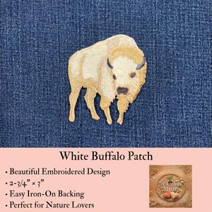 May include: An embroidered patch featuring a white buffalo with tan shading and dark horns. The patch measures 2.75 inches by 3 inches and includes an iron-on backing. The design is rendered in detailed thread work on a textured fabric surface.