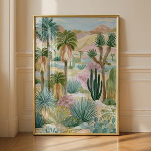 Può includere: Una stampa artistica verticale incorniciata che raffigura un paesaggio desertico con vari cactus, palme e piante di agave in tonalità di verde, rosa e marrone chiaro. Lo sfondo presenta colline ondulate sotto un cielo pallido, in una cornice dorata.