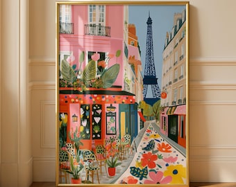 Pode incluir: Uma impressão de arte vertical emoldurada retratando uma cena de rua parisiense com um café rosa, assentos ao ar livre e grandes folhas tropicais. A Torre Eiffel é visível ao longe sob um céu azul, com flores sobre a rua de paralelepípedos.