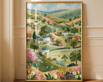 Pode incluir: Uma impressão artística emoldurada vertical com uma pintura de paisagem colorida de colinas verdes, casas de pedra e caminhos sinuosos. O primeiro plano exibe um jardim vibrante com flores rosas, vermelhas e brancas sob um céu azul.