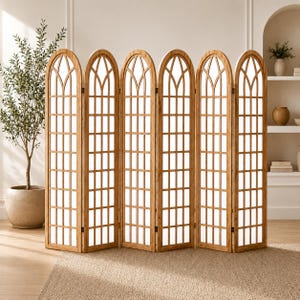 May include: A six-panel room divider featuring a light brown wooden frame with a grid pattern and arched tops. Each panel consists of a series of rectangular openings arranged in a vertical grid, topped by a curved arch design with a central vertical bar.