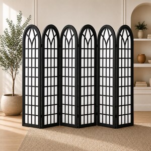 May include: A six-panel room divider featuring a black frame with a grid pattern and arched tops. Each panel contains white translucent inserts arranged in a rectangular grid, creating a window-like appearance across the folding structure.