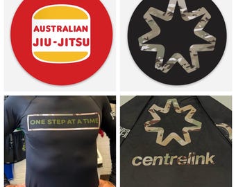 CENTRELINK rash guard & CHALLENGE COIN.