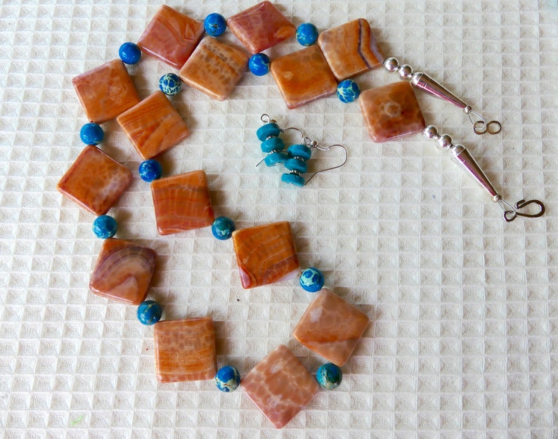 24 Inch Orange and White Crab Agate with Blue Sea Sediment Accents with Earrings