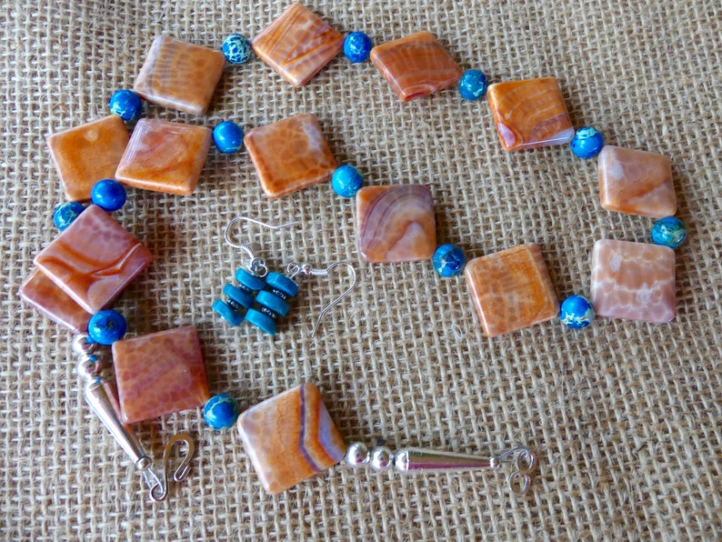 24 Inch Orange and White Crab Agate with Blue Sea Sediment Accents with Earrings