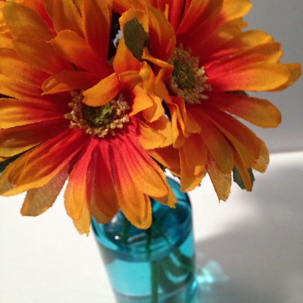 Blue Glass Vase with Orange Flowers