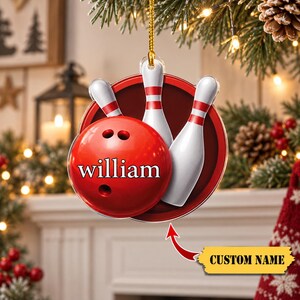 May include: A circular acrylic Christmas ornament featuring a bright red bowling ball with the name william printed in white, accompanied by three white bowling pins with red stripes, all set against a deep red circular background.
