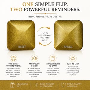 May include: A gold-colored, square metal reminder with the words "RESET" and "PAUSE" on opposite sides. The text "ONE SIMPLE FLIP. TWO POWERFUL REMINDERS" is at the top. The reminder is designed to help with focus and intention.