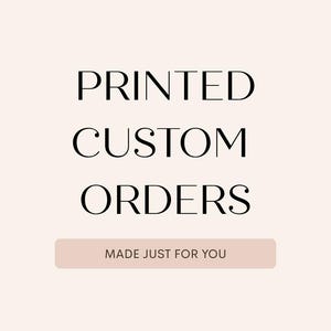 May include: A pale pink graphic sign featuring the black text PRINTED CUSTOM ORDERS in a serif font. Below this text, a horizontal rectangular bar in a darker shade of pink contains the white text MADE JUST FOR YOU in a sans-serif font.