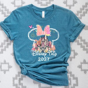 Matching Disney 2027 shirts, castle graphic tees