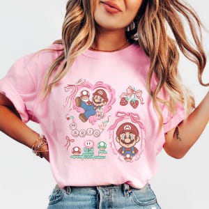 Comfort Colors Super Mario Coquette Bow Shirt, Super Mario Galaxy Movie Characters T-shirt, Universal Orlando Birthday Gift,Disney Shirt afbeelding 2