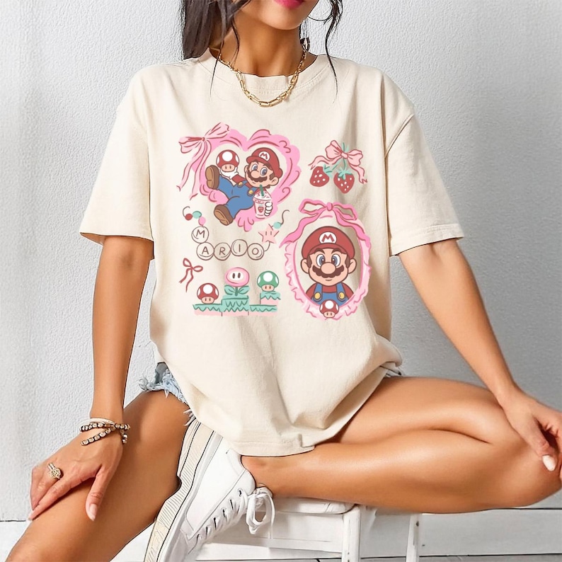 Comfort Colors Super Mario Coquette Bow Shirt, Super Mario Galaxy Movie Characters T-shirt, Universal Orlando Birthday Gift,Disney Shirt afbeelding 1