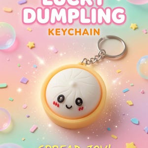 May include: A keychain featuring a white dumpling character with a smiling face, black eyes, and pink cheeks, set in a yellow base. The text LUCKY DUMPLING KEYCHAIN and SPREAD JOY! appear in the image, which is decorated with colorful sprinkles.