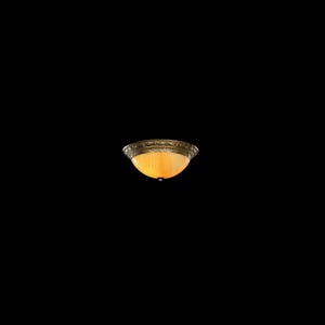 May include: A decorative ceiling light fixture with a warm, amber-colored glass bowl. The fixture has a bronze-colored, ornate metal trim around the edge. The light is a flush mount style, suitable for various interior spaces.