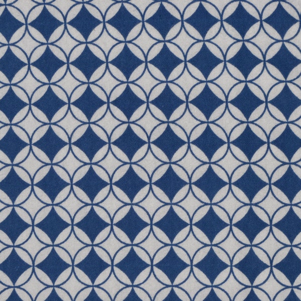 Geometric, circles, .  fabric by the yard.  Cut by the 1/2 yard (18 inches, 45.72 cm).  White, blue.