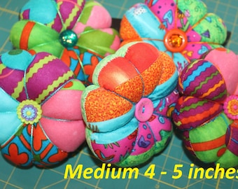 Handmade Pincushion: Quilter's Cotton, /Spring Patterns- Medium single pin cushion is 4-5 inches