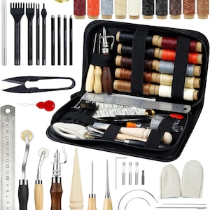 May include: A comprehensive leather crafting tool kit featuring a black zippered storage case, various metal needles, wooden-handled awls, stitching chisels, waxed threads in multiple colors, a metal ruler, a thimble, and a rotary cutter.