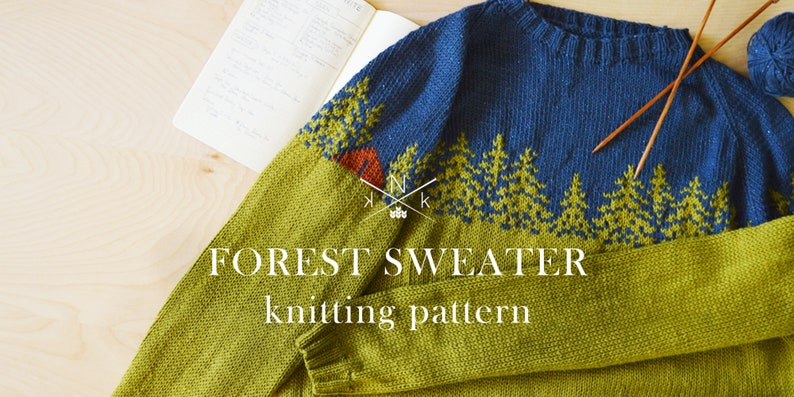 May include: A green and blue knitted sweater with a forest scene design. The sweater has a crew neck and long sleeves. The text "FOREST SWEATER knitting pattern" is printed on the front of the sweater.
