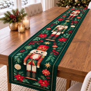 May include: A dark green table runner featuring a repeating pattern of nutcracker figures, red poinsettia flowers, green holly leaves, gold stars, and red and gold ornaments. The design is printed on a rectangular fabric runner with gold trim.