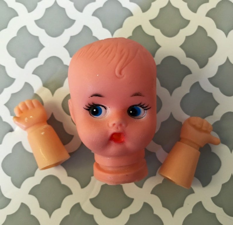 small plastic doll