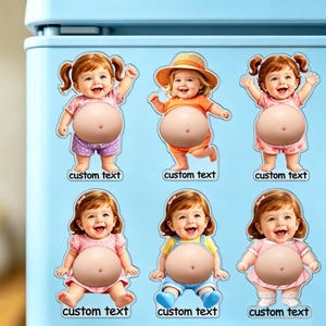 May include: Six decorative refrigerator magnets featuring illustrations of babies with prominent bellies. Each baby is depicted in different clothing, including pink outfits and a sun hat. Below each baby, the words custom text are printed.