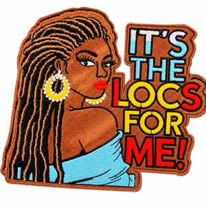 May include: An embroidered patch featuring a person with long dark brown locs, wearing large yellow hoop earrings and a light blue top. The person has red lips and is looking over their shoulder. The text IT'S THE LOCS FOR ME! is in blue, red, and yellow.