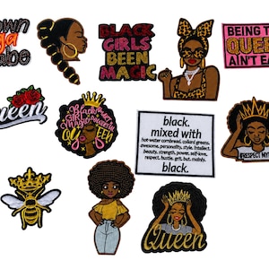 May include: A collection of embroidered patches with various designs and text. The patches feature phrases like "Brown Suga Babe," "Black Girls Been Magic," and "Being the Queen Ain't Easy." Other patches depict Black women with crowns and the word "Queen."