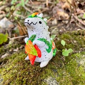 Leaf collector kaiju, stone lizard, clay collectible figure, autumn decor, fantasy figure