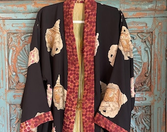 Preciosa chaqueta de seda negra única en su clase