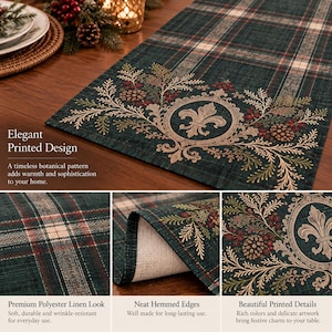 May include: A dark green table runner featuring a plaid pattern with thin red and white lines. The runner displays a printed botanical design with pine branches, red berries, and a central gold-toned emblem with a fleur-de-lis motif.