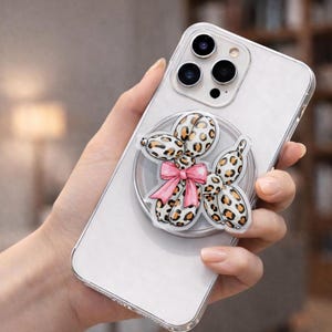 May include: A set of three ceramic nesting bowls in shades of blue, green, and white. The bowls feature a speckled glaze and a simple, modern design. The largest bowl measures approximately 6 inches in diameter.