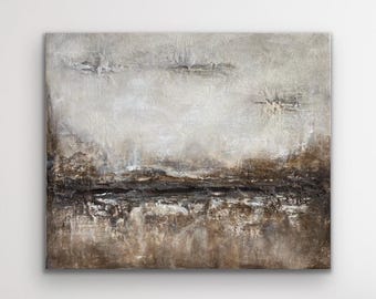 May include: Abstract landscape painting with a textured surface. The artwork features a neutral color palette of beige, brown, and black, creating a sense of depth and dimension. The composition evokes a serene, natural scene, suitable for home decor.