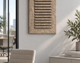 May include: A rectangular wall art piece featuring a textured, sandy-beige finish with a series of ten horizontal, raised bars centered within a flat border. The surface has a rough, granular appearance, creating a tactile, layered effect.