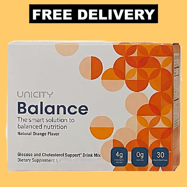 May include: A rectangular box of Unicity Balance dietary supplement drink mix with natural orange flavor. The white packaging features a geometric pattern of orange and peach circles, with text stating Glucose and Cholesterol Support.
