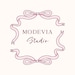 ModeviaStudio store logo