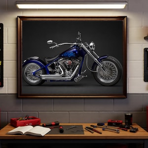 May include: Framed image of a blue motorcycle with chrome accents. The motorcycle has a custom paint job and wire wheels. The image is displayed in a workshop setting, with tools and equipment visible.