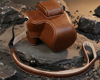 専用設計レザーカメラケース：Canon R50 R50V R100用純正バッグ、ミラーレスカメラ用耐衝撃カバー