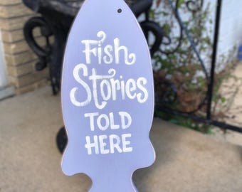 Fish Stories Told Here sign/pale blue hand painted/man cave/gifts for him/cabin decor/cottage decor/wooden fish sign/lake sign/garage sign