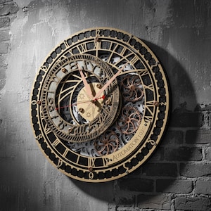 Automaton Prag astronomiskt ur, svartguld väggklocka, öppen mekanism, roterande kugghjul, tyst kvartsdekor