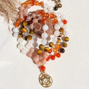 108 Mala Beads Necklace with Sacral Chakra Symbol, Tiger’s Eye, Orange Agate, Moonstone & Sunstone