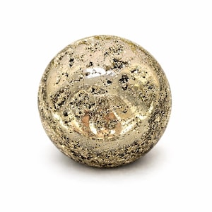 May include: A spherical pyrite gemstone, also known as fool's gold, with a metallic gold color and a textured surface. The pyrite sphere is set against a white background.