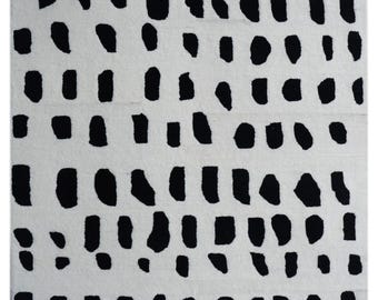 Tappeti tuftati a mano