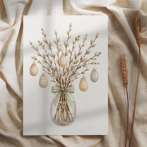 以下が含まれることがあります： 透明なガラスの花瓶に入った、緑のリボンで結ばれた猫柳の枝のブーケの水彩イラスト。装飾的なイースターエッグが枝から吊り下げられています。背景はニュートラルベージュです。